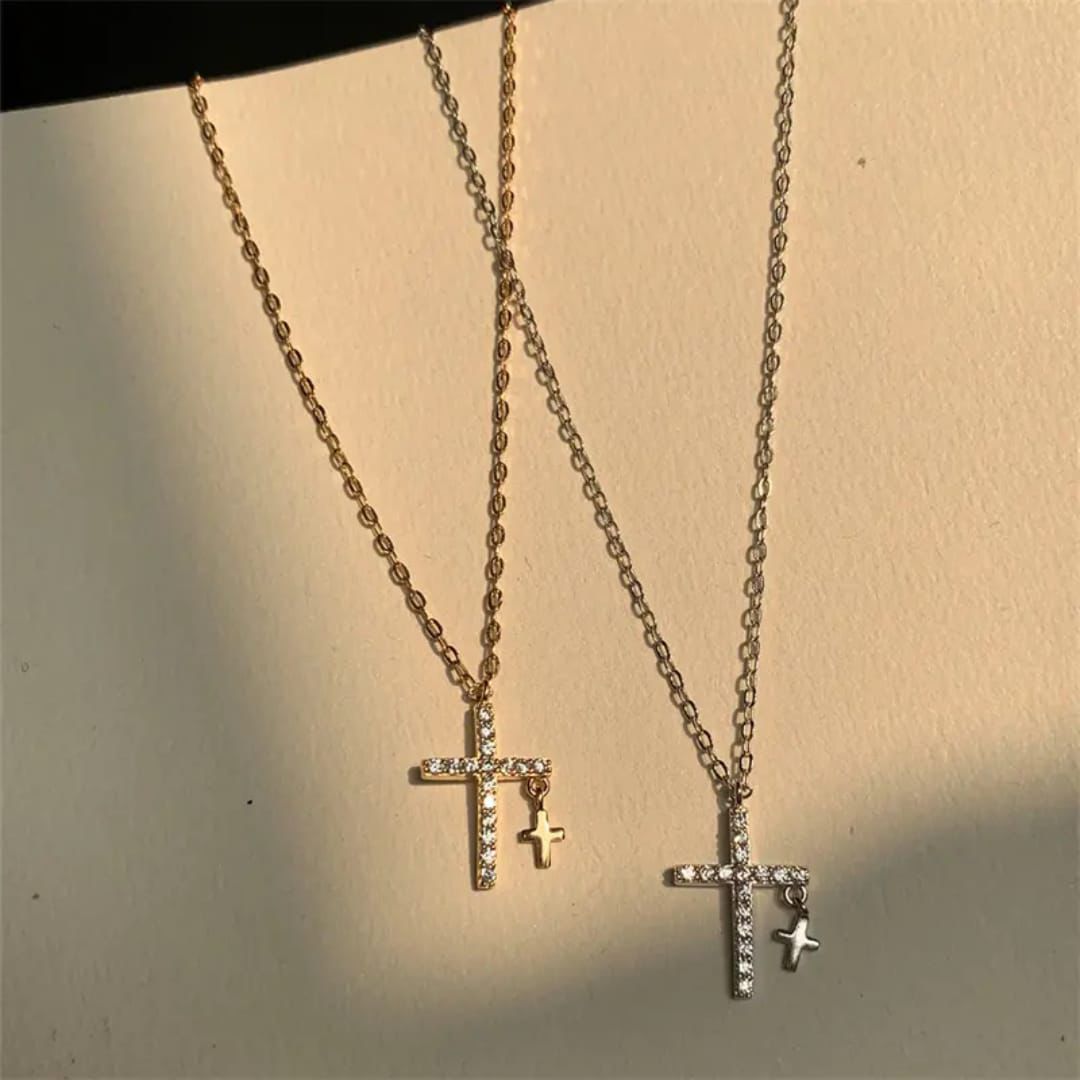 Two gold necklaces with cross pendants on a beige background Goldess jewelley necklace 18k pure gold plating